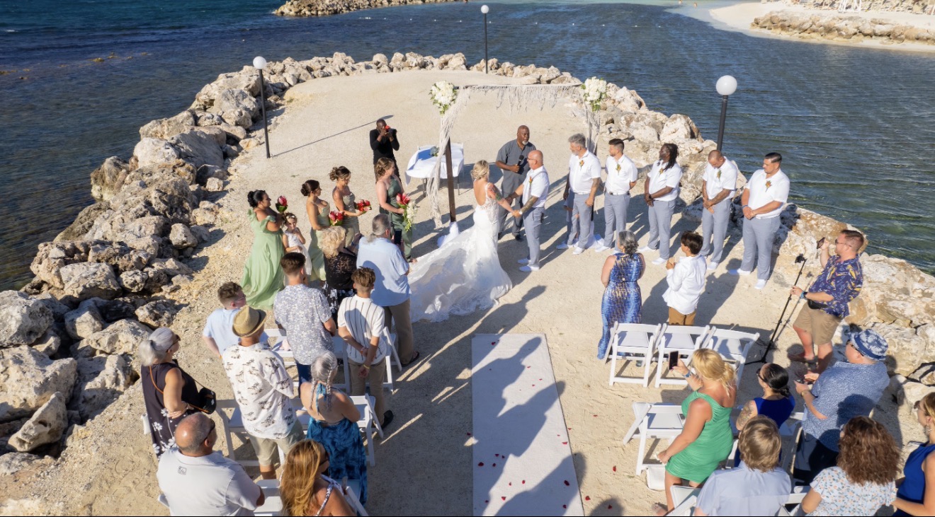 Destination wedding ceremony by the ocean